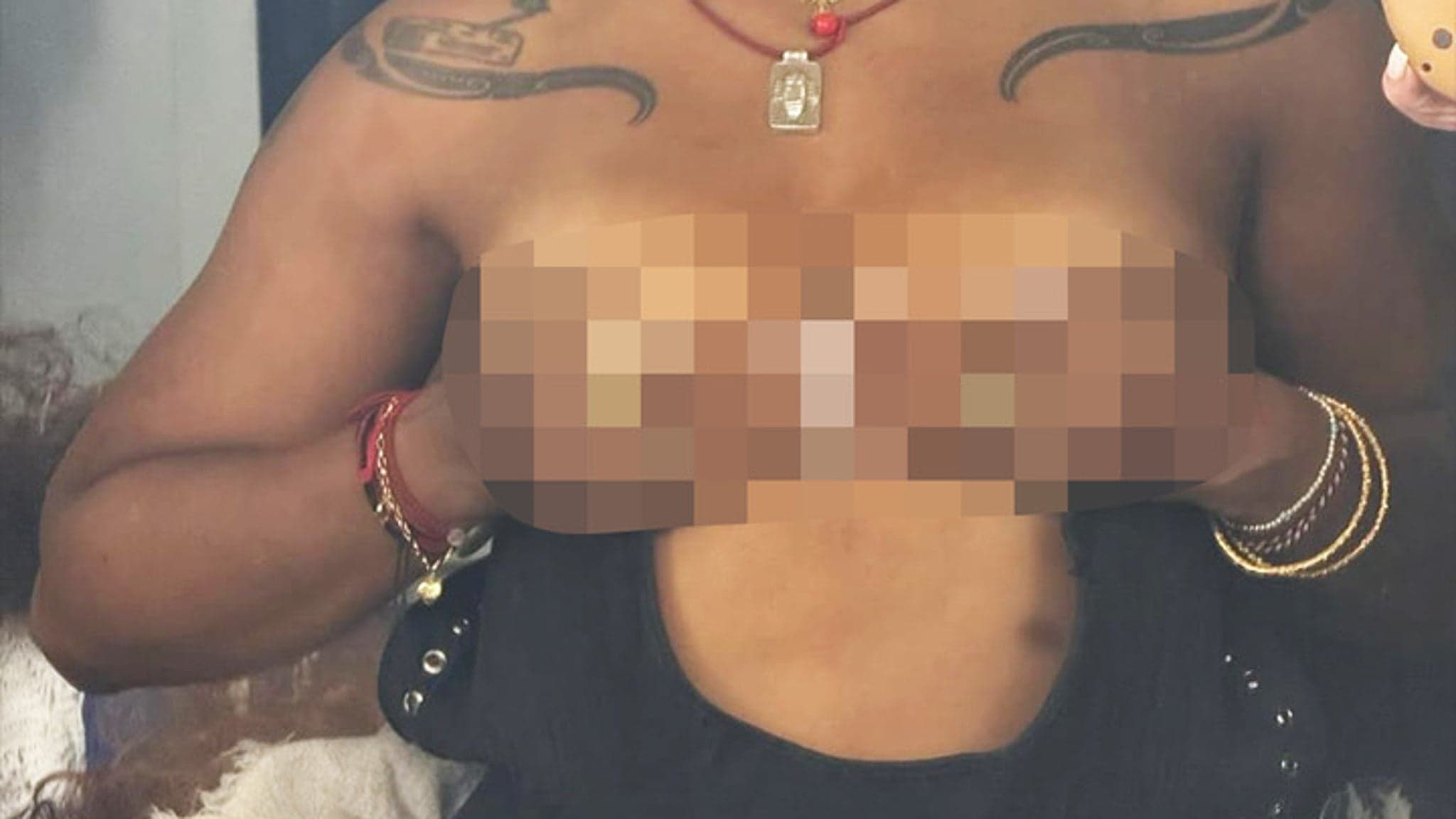 Guess Who's Topless and Turnin' Up the Heat?