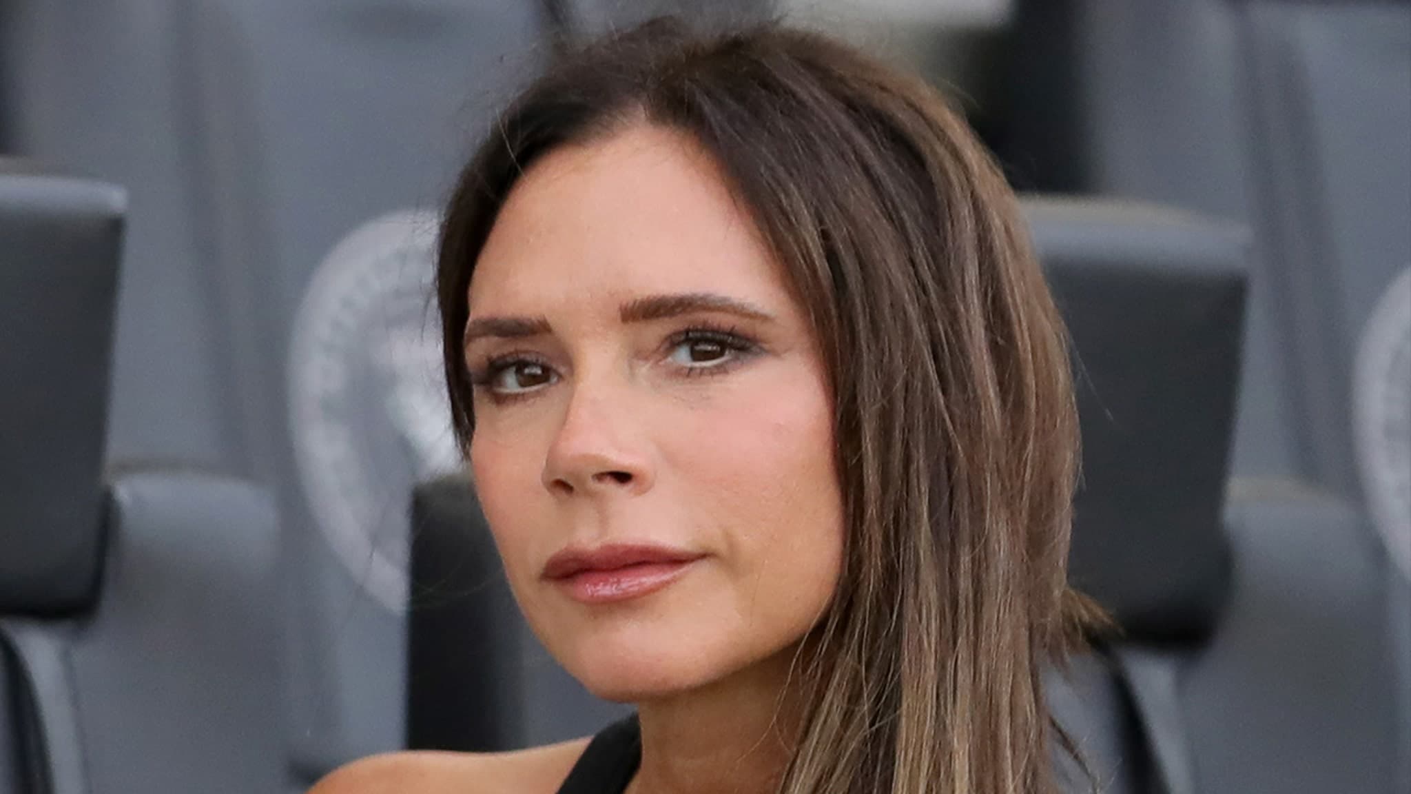 Victoria Beckham: The 'Miserable Cow' Who's Actually Smiling on the Inside!