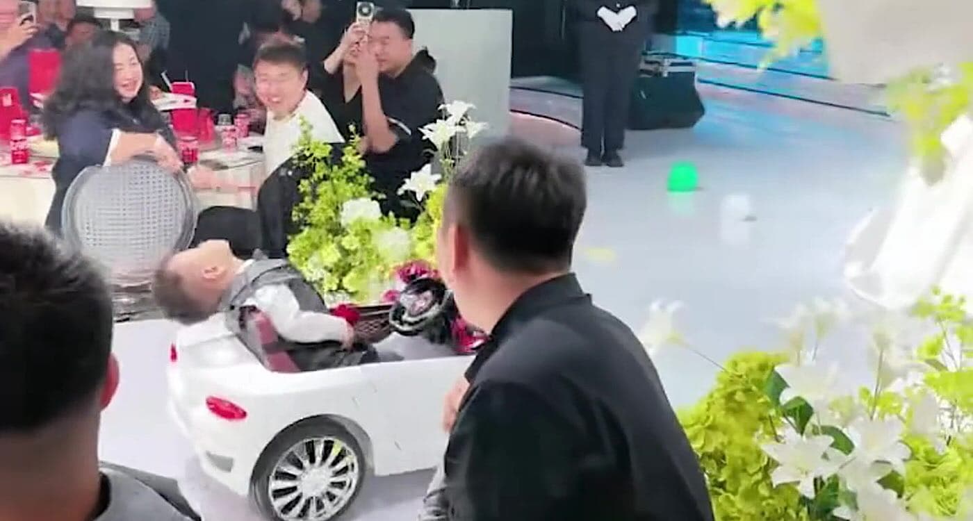 Little Ring Bearer Steals Wedding Show by Catching Zs in Mini Sports Car!