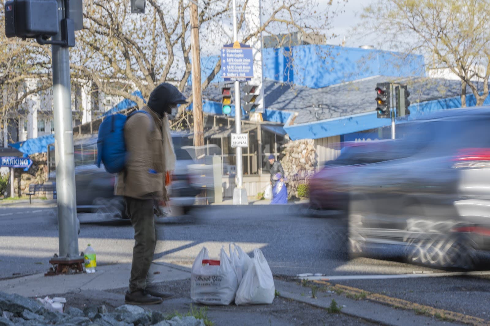 Behind the Signs: Unveiling the Stories of Sacramento's Unhoused