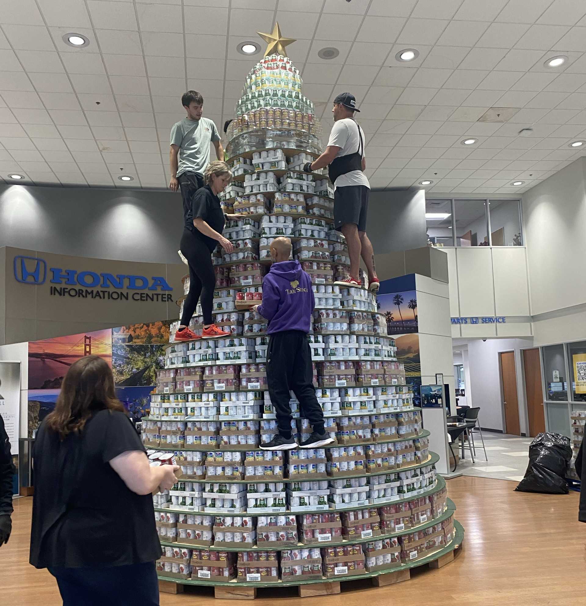 Building Generosity: Sacramento's 25-Foot Christmas CanTree Takes the Holidays to New Heights!